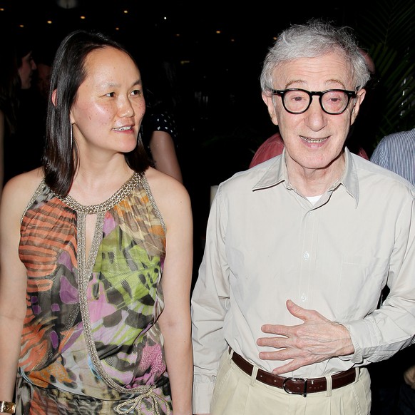 FILE - This June 20, 2012 file photo released by Starpix, director Woody Allen and his wife Soon-Yi Previn attend the premiere after party for his film &quot;To Rome with Love,&quot; in New York. Dyla ...