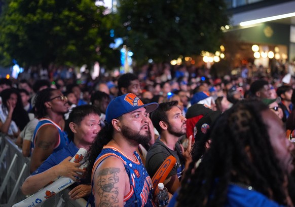 NEW YORK, UNITED STATES - JUNE 5: Thousands of New York Knicks fans gather inside and outside Madison Square Garden and celebrate across New York City after the team's NBA Finals Game 2 victory o ...