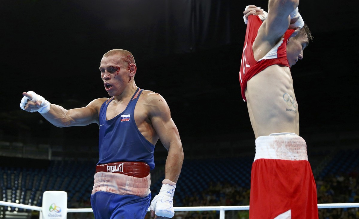 2016 Rio Olympics - Boxing - Quarterfinal - Men's Bantam (56kg) Quarterfinals Bout 223 - Riocentro - Pavilion 6 - Rio de Janeiro, Brazil - 16/08/2016. Vladimir Nikitin (RUS) of Russia reacts next ...