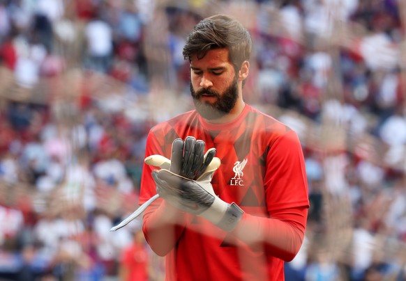 epa07618466 Liverpool goalkeeper Alisson Becker during the warm up before the UEFA Champions League final between Tottenham Hotspur and Liverpool FC at the Wanda Metropolitano stadium in Madrid, Spain ...