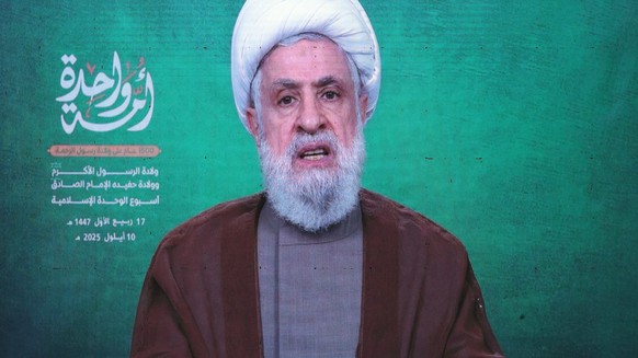 epa12367749 Hezbollah Secretary General Sheikh Naim Qassem delivers a televised speech marking the birth anniversary of Prophet Mohammad (PBUH) in the southern suburb of Beirut, Lebanon, 10 September  ...