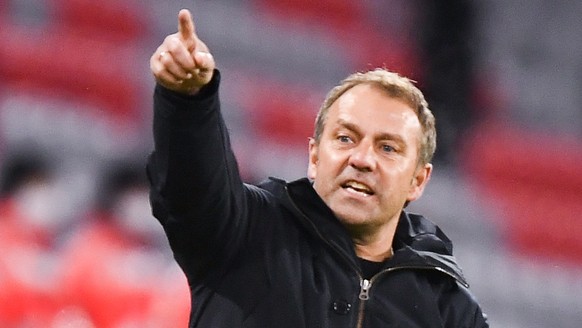 epa09015134 Bayern&#039;s head coach Hansi Flick reacts during the German Bundesliga soccer match between FC Bayern Munich and DSC Arminia Bielefeld in Munich, Germany, 15 February 2021. EPA/LUKAS BAR ...