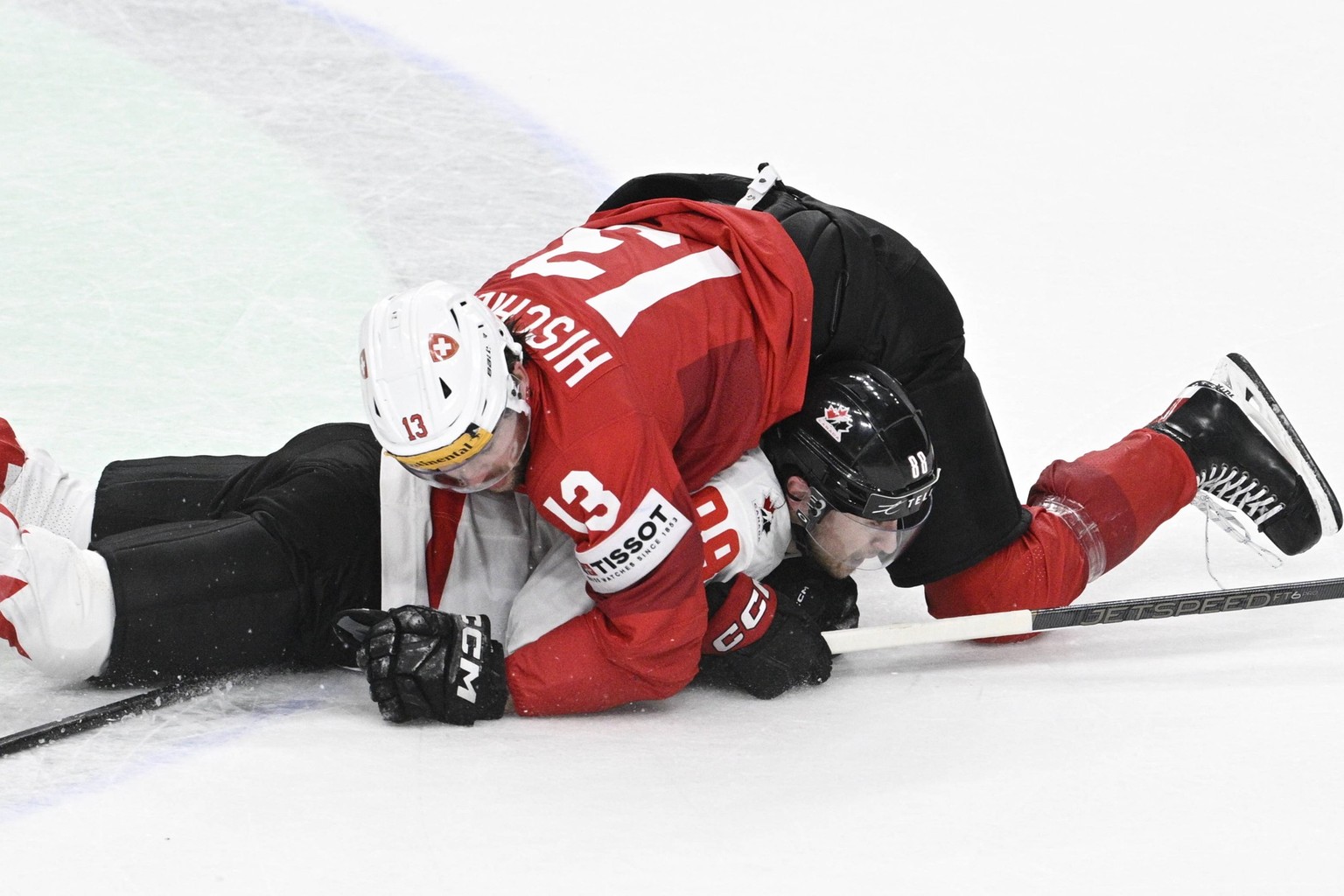 L-R Nico Hischier SUI and Andrew Mangiapane CAN in action during the 2024 IIHF World Championship, WM, Weltmeisterschaft semi-final match Canada vs Switzerland, in Prague, Czech Republic, on May 25, 2 ...