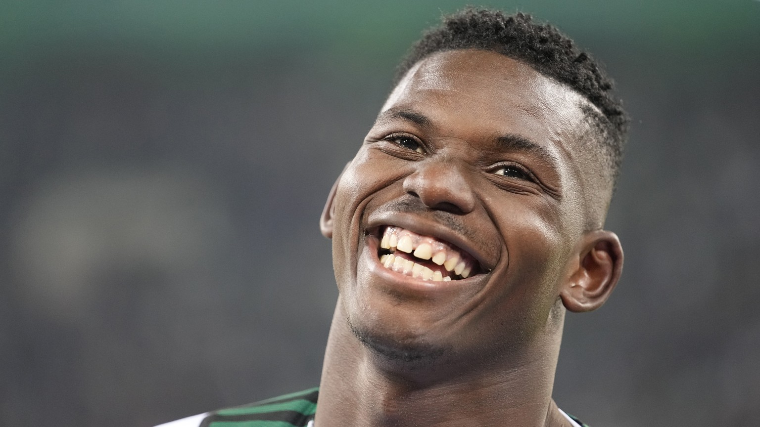 Moenchengladbach&#039;s Breel Embolo smiles after the German Soccer Cup match between Borussia Moenchengladbach and Bayern Munich at the Borussia Park in Moenchengladbach, Germany, Wednesday, Oct. 27, ...