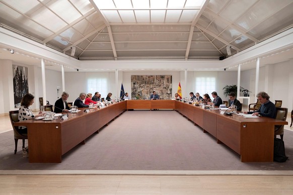 epa08430464 A handout photo made available by the office of the Prime Minister of Spain (&#039;La Moncloa&#039;) shows Spanish Prime Minister Pedro Sanchez (C) chairing the meeting of the Coronavirus  ...