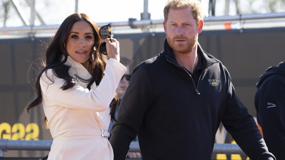Prince Harry and Meghan Markle, Duke and Duchess of Sussex visit the track and field event at the Invictus Games in The Hague, Netherlands, Sunday, April 17, 2022. The week-long games for active servi ...