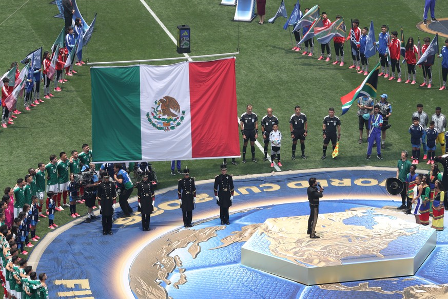 epa13031538 Mexican singer Alejandro Fernandez sings the Mexican national anthem during the pre-game show before the opening match of the FIFA World Cup 2026 between Mexico and South Africa in Mexico  ...