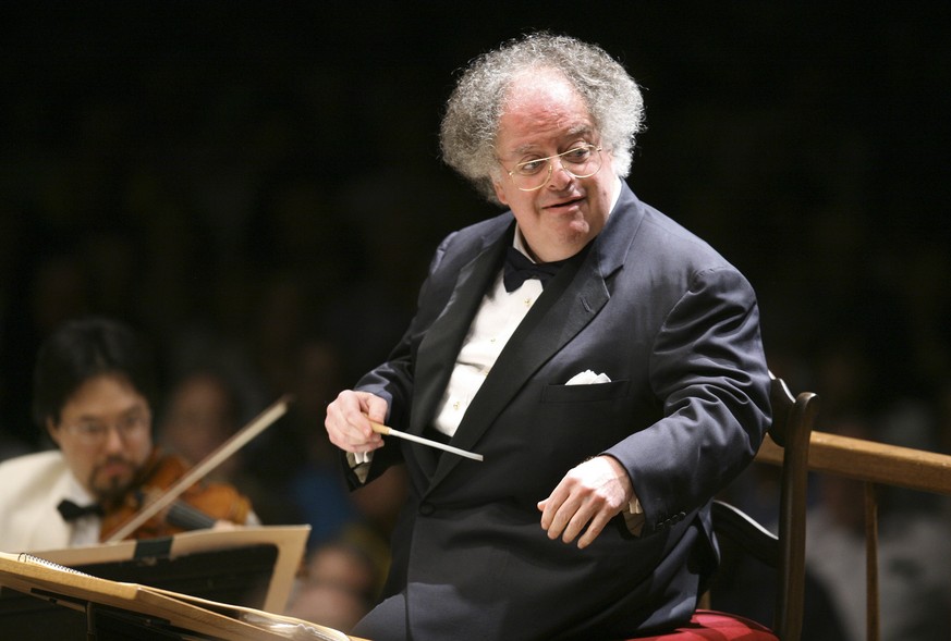 FILE - In this July 7, 2006 file photo, Boston Symphony Orchestra music director James Levine conducts the symphony on its opening night performance at Tanglewood in Lenox., Mass. New York&#039;s Metr ...