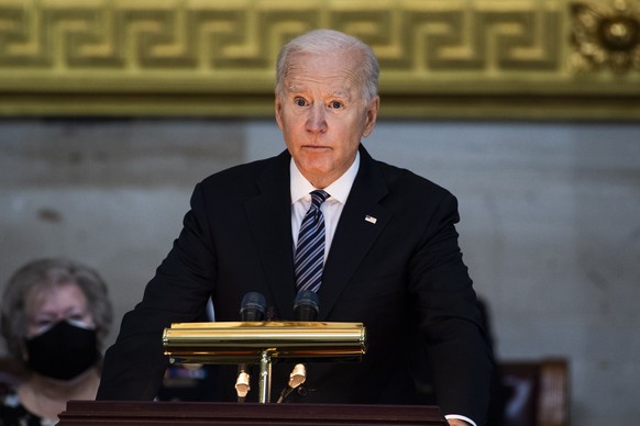 epa09133674 US President Joe Biden speaks during the service for U.S. Capitol Officer William ?Billy? Evans, as his remains lie in honor in the Capitol Rotunda in Washington, DC, USA, on 13 April 2021 ...