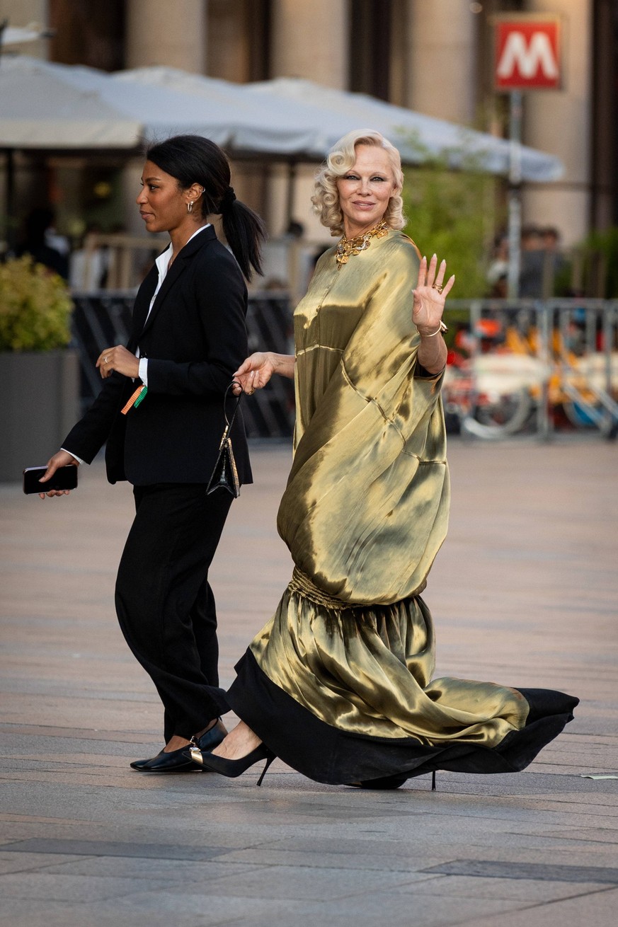 Celebrity Sightings at Vogue world show during the Milan Fashion Week - Womenswear Spring/Summer 2027 in Milan, Italy, on 22 September 2026 Pamela Anderson arrives at Vogue world show during the Milan ...
