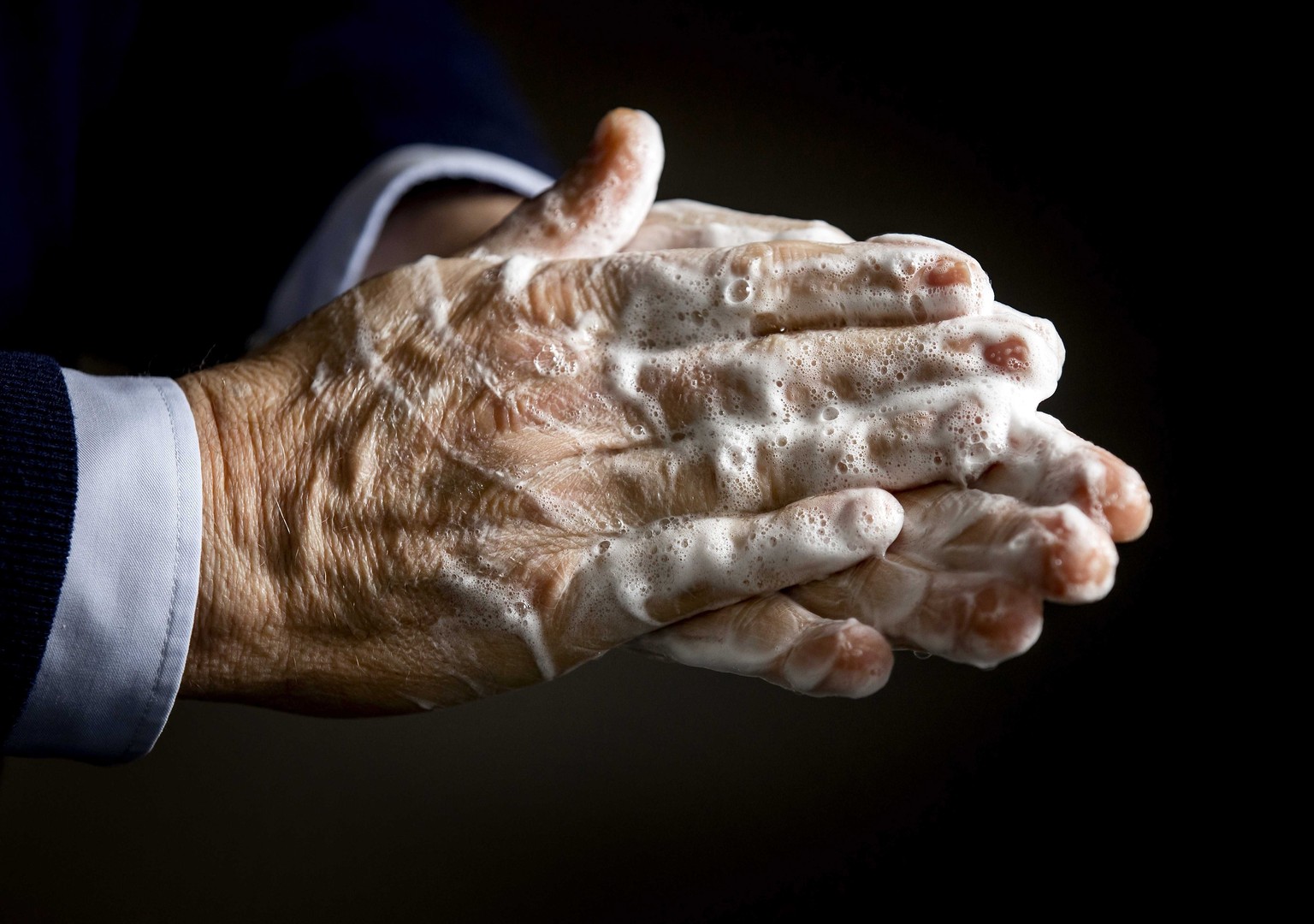 epa08269267 ILLUSTRATION - A person washes their hands with disinfectant soap, in Heiloo, The Netherlands, 04 March 2020. Authorities worldwide have advised people to take basic measures to prevent th ...