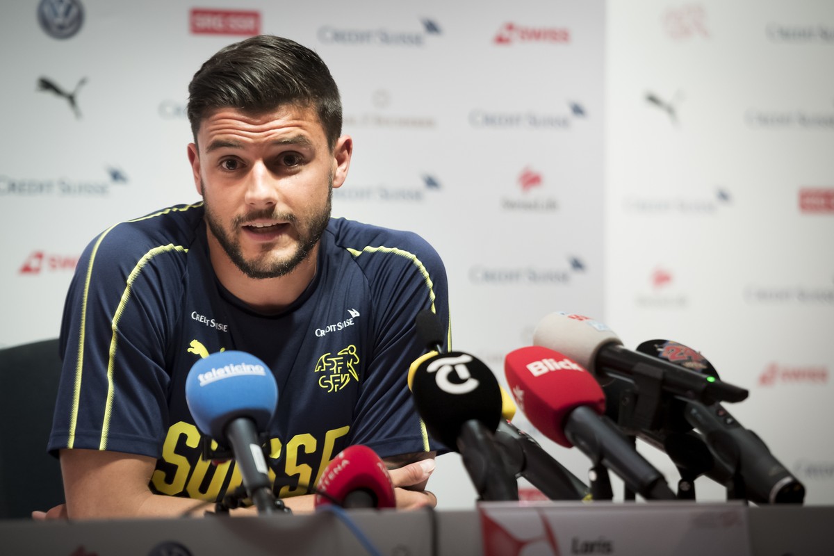 Switzerland's player Loris Benito speaks during a press cionference after a training session at the PortoGaia training center, in Crestuma near Porto, Portugal, Monday, June 3, 2019. Portugal wil ...