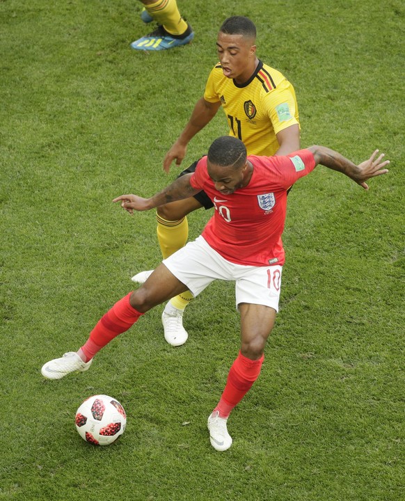 England&#039;s Raheem Sterling, foreground, controls the ball as Belgium&#039;s Yannick Carrasco defends during the third place match between England and Belgium at the 2018 soccer World Cup in the St ...