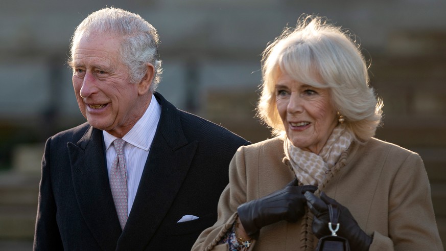 epa10418195 Britain&#039;s King Charles III (L) and Camilla, The Queen Consort (R) leave Bolton Town Hall in Bolton, Britain, 20 January 2023. The royal couple met representatives from the community i ...