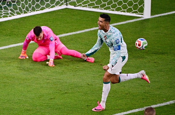 KEYPIX - Portugal's Cristiano Ronaldo (7) celebrates after scoring their first a goal from a penalty kick during the World Cup round of 32 soccer match between Portugal and Croatia in Toronto, Th ...