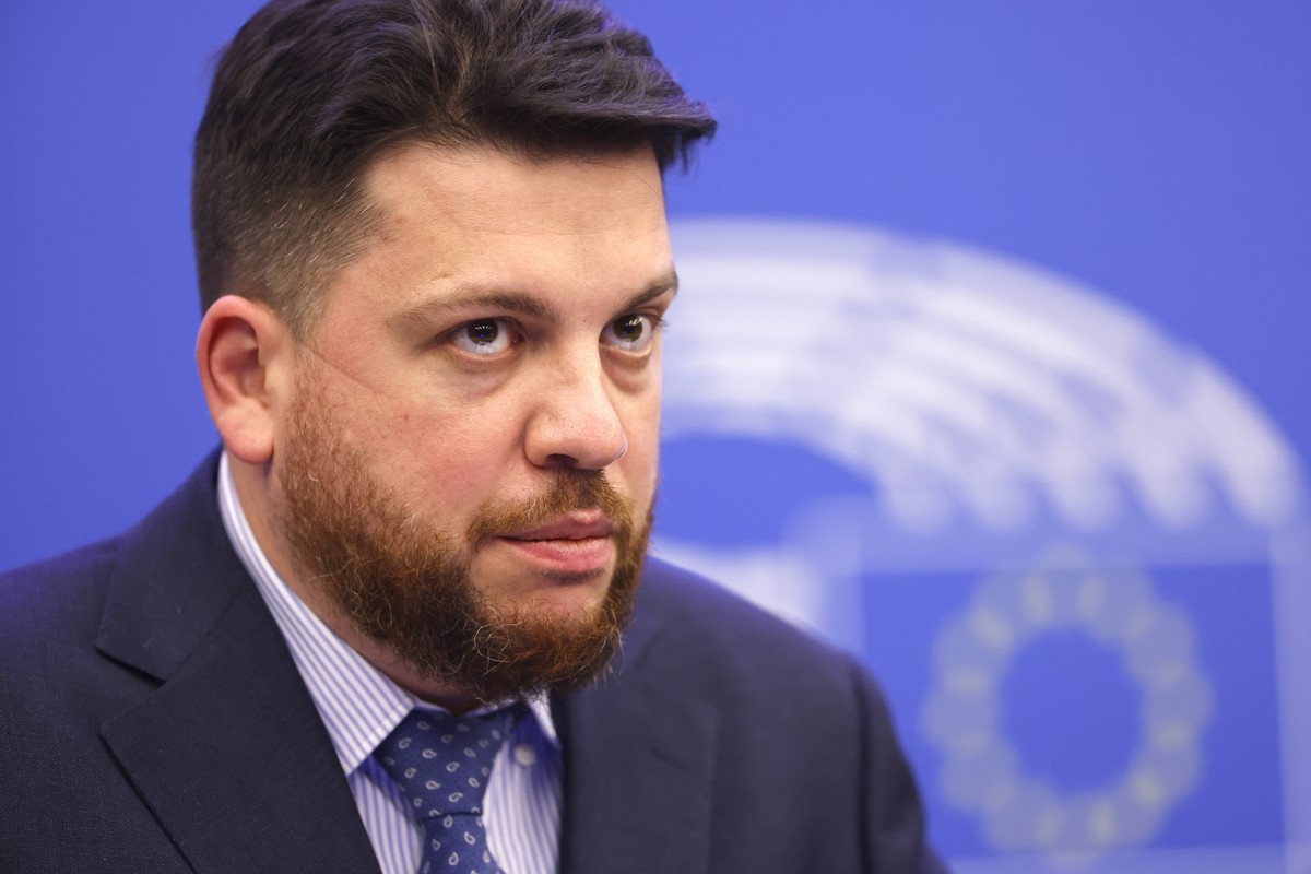 FILE - Leonid Volkov, chief of staff for the late Russian opposition leader Alexei Navalny watches a session of the European Parliament in Strasbourg, France, on Dec. 15, 2021. Volkov had his arm brok ...
