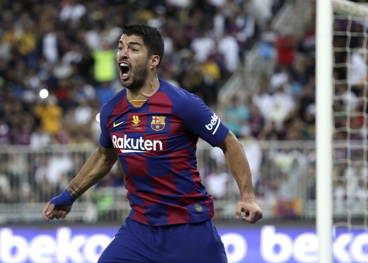 Barcelona's Luis Suarez reacts during the Spanish Super Cup semifinal soccer match between Barcelona and Atletico Madrid at King Abdullah stadium in Jiddah, Saudi Arabia, Thursday, Jan. 9, 2020.  ...