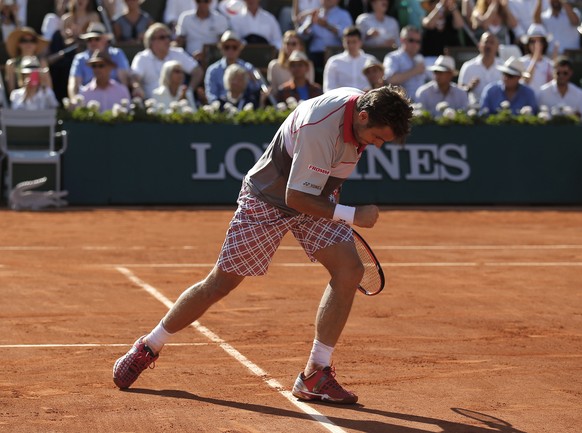Switzerland's Stan Wawrinka reacts shortly before defeating Serbia's Novak Djokovic in their final match of the French Open tennis tournament at the Roland Garros stadium, Sunday, June 7, 2015 in Paris.  (AP Photo/Francois Mori)