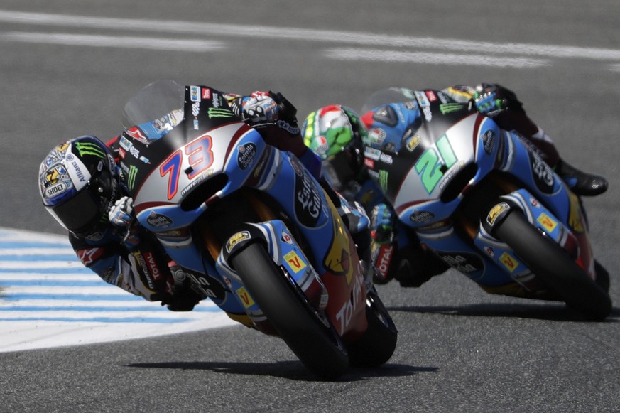 Moto2 rider Alex Marquez of Spain leads Franco Morbidelli of Italy on his way to a win at the Spanish Motorcycle Grand Prix at the Jerez racetrack in Jerez de la Frontera, Spain, Sunday, May 7, 2017.  ...