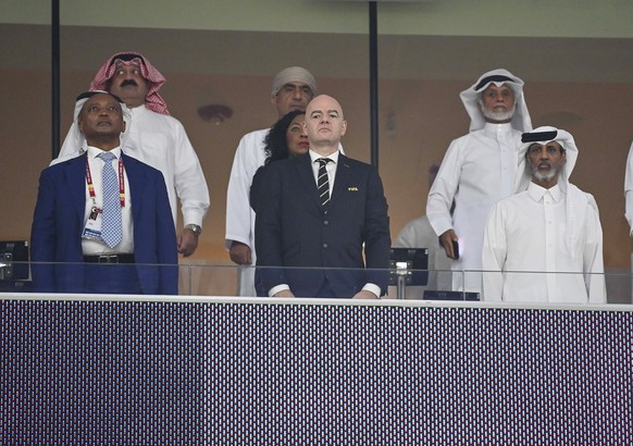 epa09643779 FIFA President Gianni Infantino (C) and Qatar Football Association&#039;s president Sheikh Hamad Bin Khalifa Bin Ahmed al-Thani (R) stand for the national anthems ahead of the FIFA Arab Cu ...