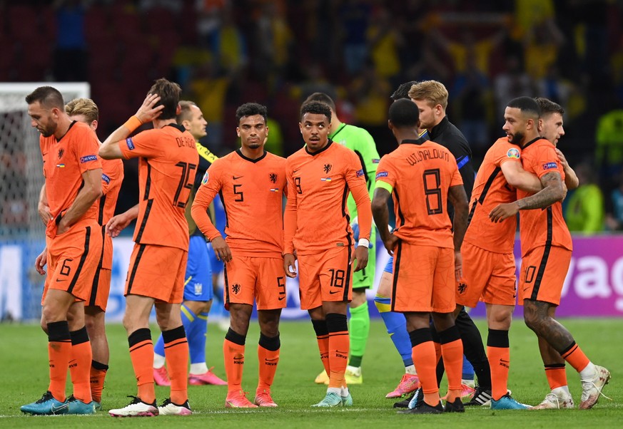epa09269122 Players of the Netherlands celebrate their win after the UEFA EURO 2020 preliminary round group C match between the Netherlands and Ukraine in Amsterdam, the Netherlands, 13 June 2021. EPA ...