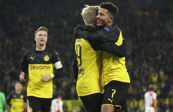 epa08061157 Dortmund&#039;s Julian Brandt (C) celebrates with teammate Jadon Sancho (R) after scoring during the UEFA Champions League group F soccer match between Borussia Dortmund and Slavia Prague  ...