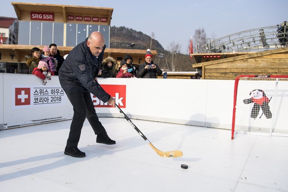 Switzerland&#039;s Federal Councillor and President Alain Berset reacts as he play ice hockey at the House of Switzerland during the XXIII Winter Olympics 2018 in Pyeongchang, South Korea, on Saturday ...