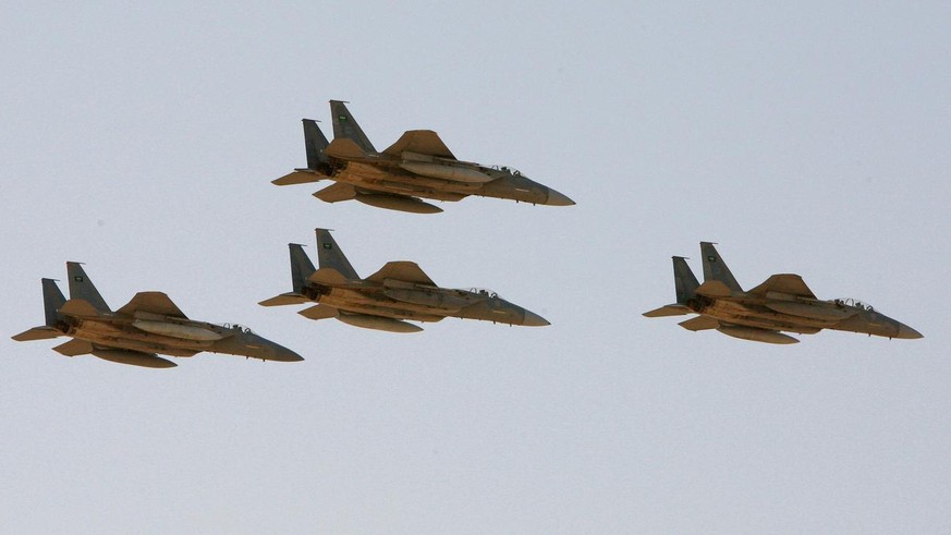 FILE - In this Sunday, Jan. 25, 2009 file photo, F-15 warplanes of the Saudi Air Force fly over the Saudi Arabian capital Riyadh during a graduation ceremony at King Faisal Air Force University. The O ...