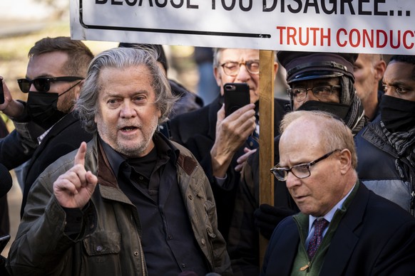 epa09583955 Trump ally and former White House adviser Steve Bannon speaks to the media after appearing in federal court in Washington, DC, USA, 15 November 2021. Bannon surrendered to authorities afte ...