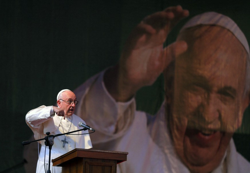 Pope Francis gives his speech during a meeting with young people at Notre Dame College in Dhaka, Bangladesh, Saturday, Dec. 2, 2017. Pope Francis urged Bangladeshi priests and nuns to resist the &quot ...