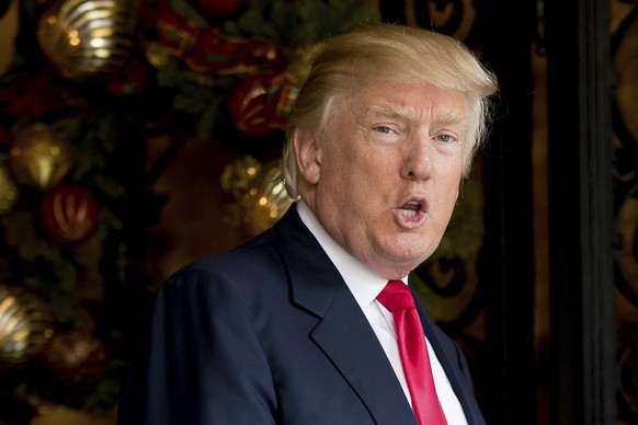 President-elect Donald Trump speaks to members of the media at Mar-a-Lago, in Palm Beach, Fla., Wednesday, Dec. 21, 2016. (AP Photo/Andrew Harnik)