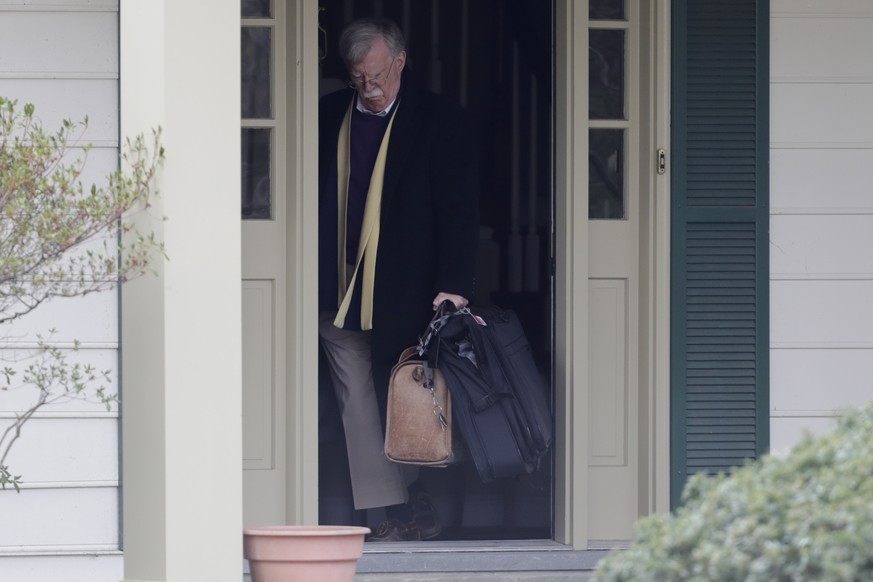 Former National security adviser John Bolton leaves his home in Bethesda, Md. Wednesday, Jan. 29, 2020. (AP Photo/Luis M. Alvarez)
John Bolton