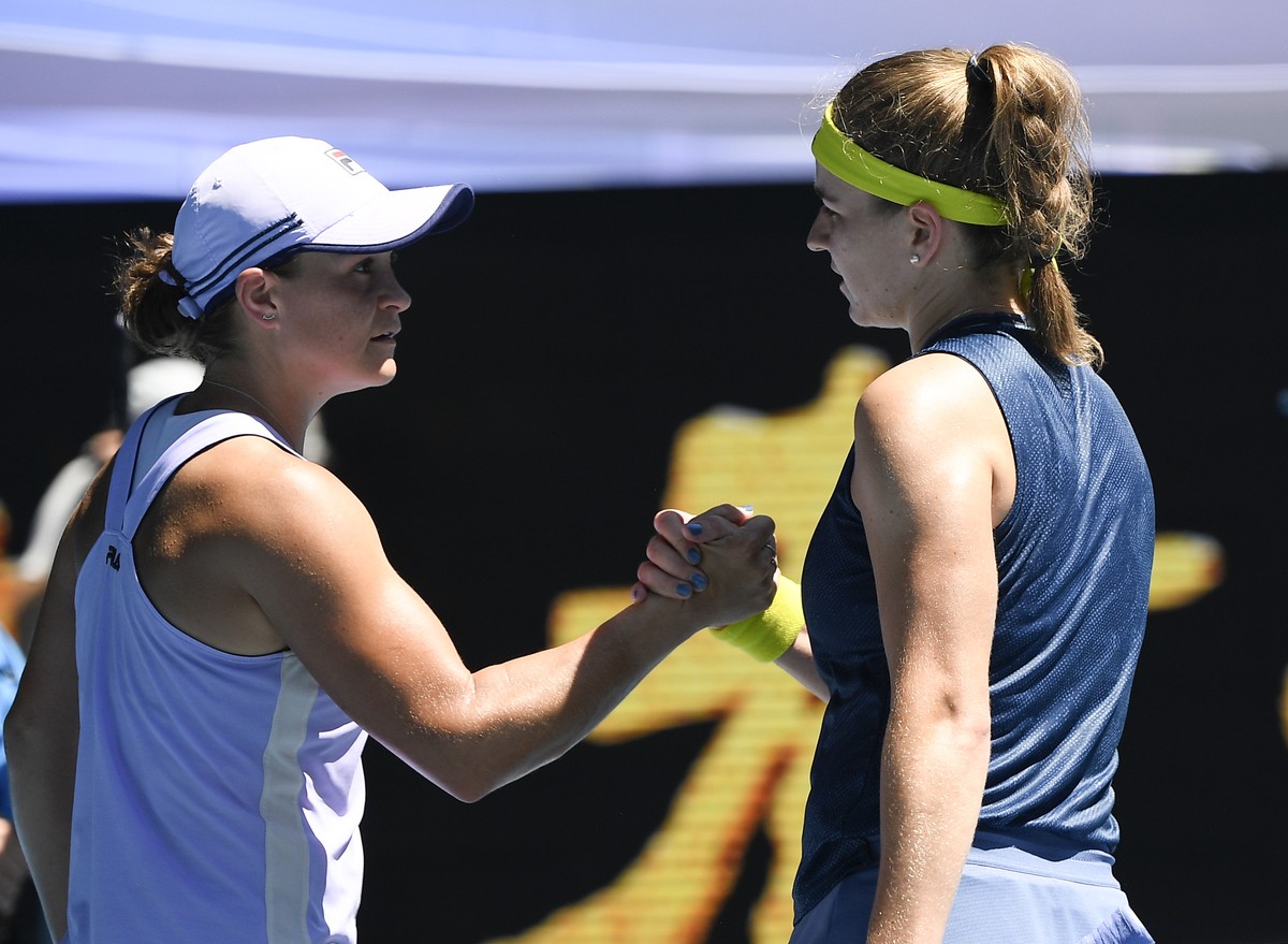Australia's Ash Barty, left, congratulates Karolina Muchova of the Czech Republic after their quarterfinal match at the Australian Open tennis championship in Melbourne, Australia, Wednesday, Feb ...