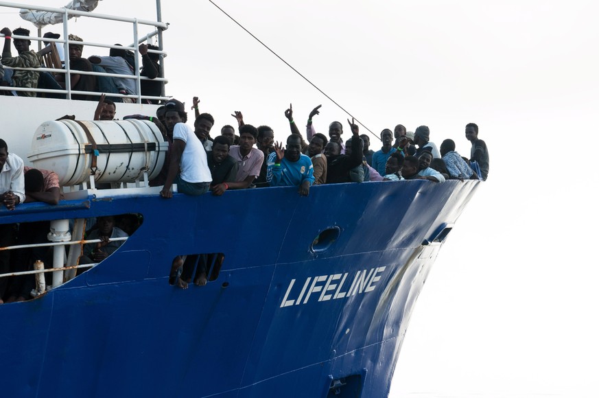 epa06828482 A handout photo made available by German NGO Mission Lifeline shows migrants rescued in international waters of the Mediterranean Sea onboard of the dutch flagged vessel LIFELINE, 21 June  ...