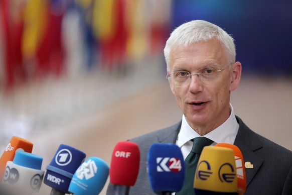 epa10716845 Latvia's Prime Minister Krisjanis Karins speaks to the media as he arrives for a European Council in Brussels, Belgium, 29 June 2023. EU leaders are gathering in Brussels for a two-da ...