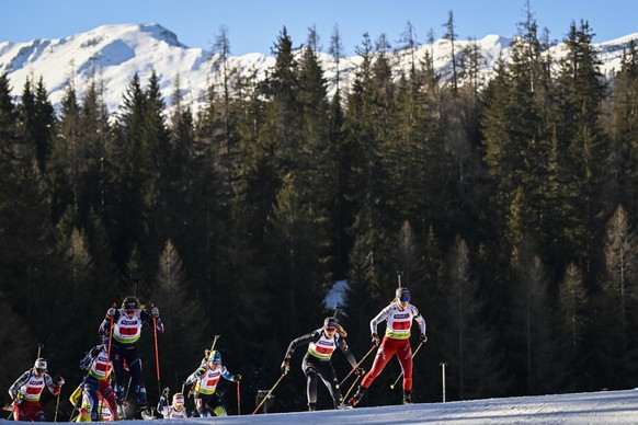 Lea Meier of Switzerland, right, and competition during the mixed relay race at the IBU European Open Biathlon Championships, on Sunday, January 29, 2023, in Lenzerheide, Switzerland. (KEYSTONE/Gian E ...