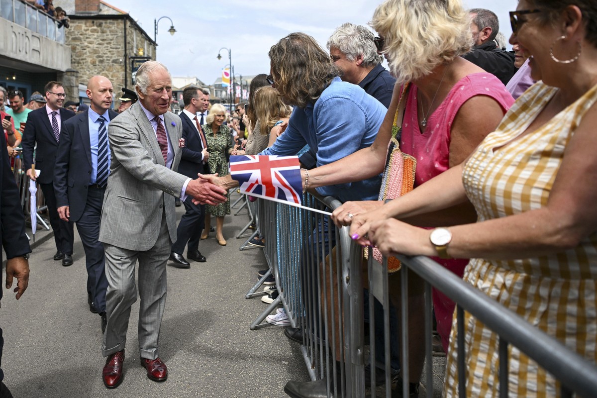 Britain's King Charles III meets members of the public during a visit to St Ives Harbour, Cornwall, England, to meet members of the Cornish community, Thursday July 13, 2023. (Finnbarr Webster/PA ...