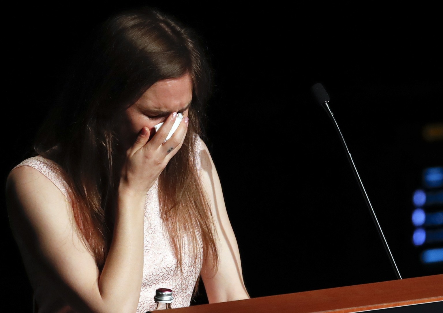 Amanda Knox gets emotional as she speaks at a Criminal Justice Festival at the University of Modena, Italy, Saturday, June 15, 2019. Knox, a former American exchange student who became the focus of a  ...