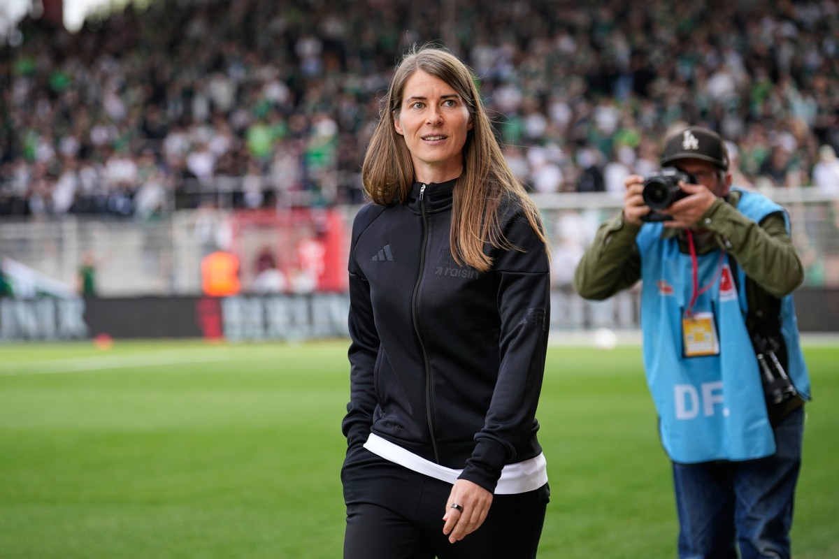 New head coach of German Bundesliga soccer club 1. FC Union Berlin Marie-Louise Eta looks on during the warm up prior to the German Bundesliga soccer match between FC Union Berlin and Wolfsburg in Ber ...