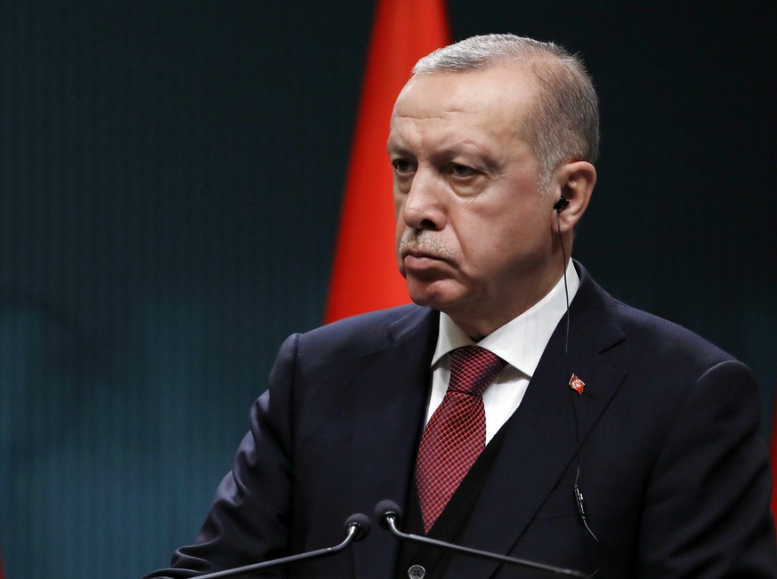 Turkey&#039;s President Recep Tayyip Erdogan listens to Iraq&#039;s President Barham Salih during a joint news conference in Ankara, Turkey, Thursday, Jan. 3, 2019. Erdogan has reaffirmed support for  ...