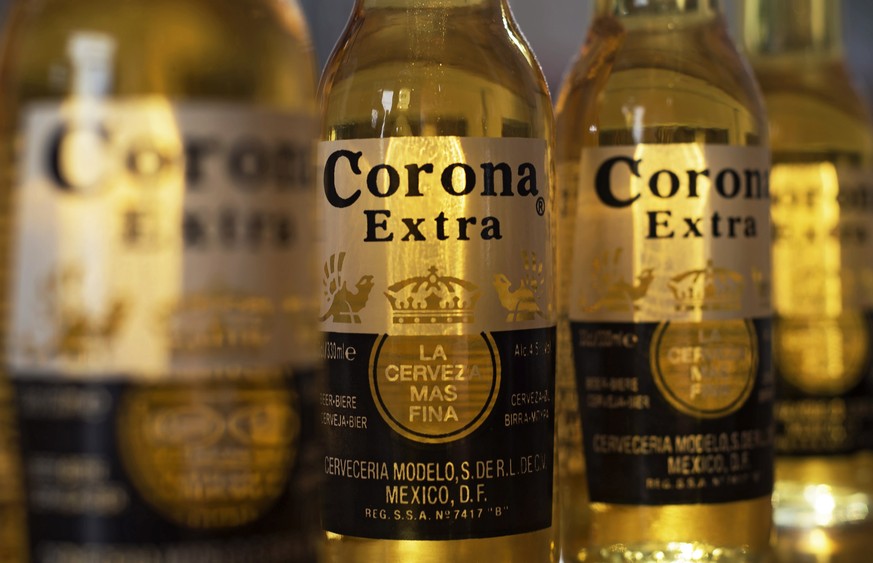 epa08252549 (FILE) - Bottles of Corona beer pictured in London, Britain, 28 September 2016 (reissued 27 February 2020). Reports on 27 February 2020 state the sales of Corona beer have fallen drastical ...