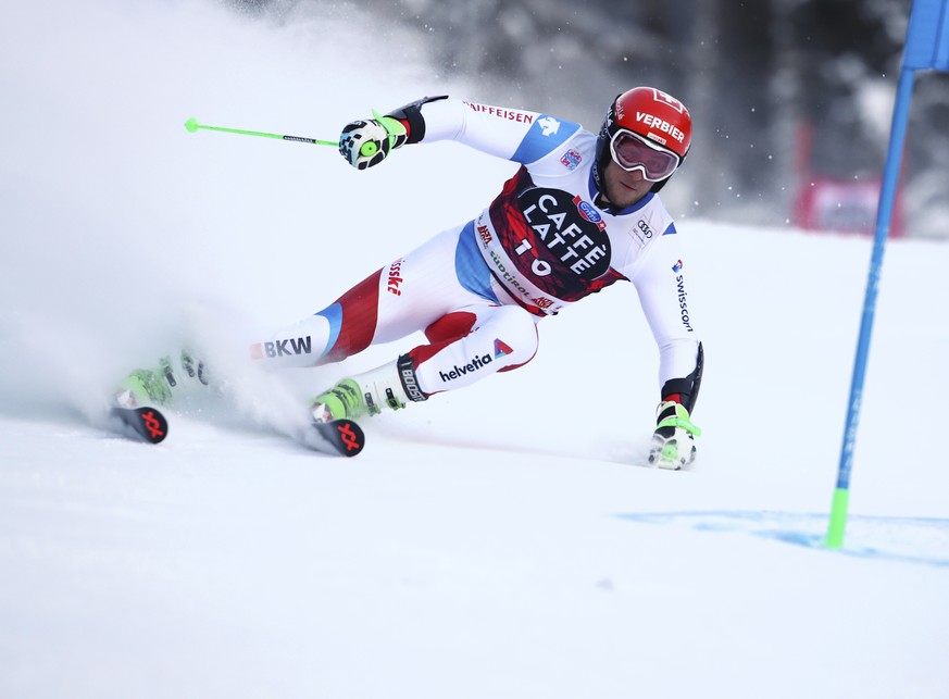 Switzerland&#039;s Justin Murisier competes during the first run of an alpine ski, men&#039;s World Cup giant slalom in Alta Badia, Italy, Sunday, Dec. 17, 2017. (AP Photo/Marco Trovati)