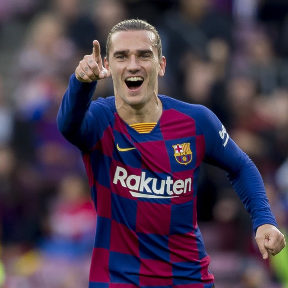 Barcelona's Antoine Griezmann celebrates after scoring a goal during a Spanish La Liga soccer match between Barcelona and Alaves at Camp Nou stadium in Barcelona, Spain, Saturday, Dec. 21, 2019. ...