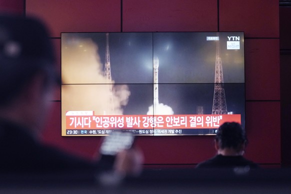A TV screen shows a file image of North Korea&#039;s rocket launch during a news program at a bus terminal in Seoul, South Korea, Monday, May 27, 2024. North Korea on Monday, May 27, 2024, launched a  ...