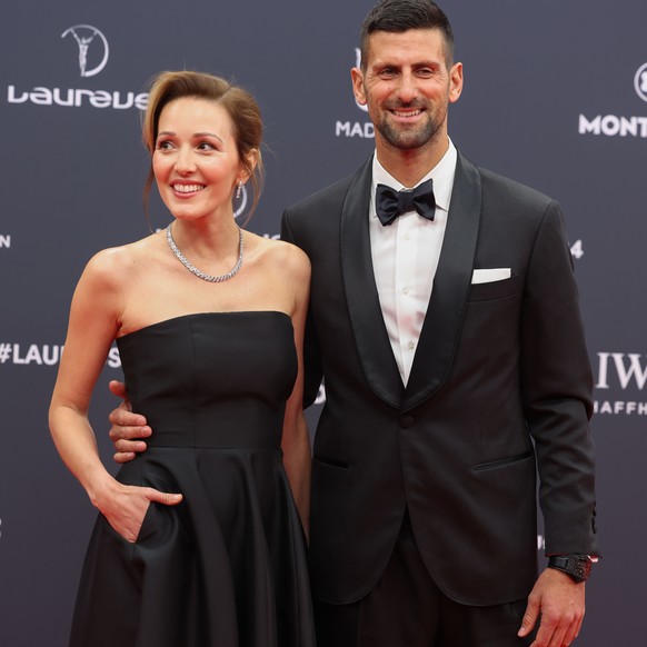 epa11294449 Serbian tennis player Novak Djokovic (R) and his wife Jelena Djokovic (L) pose during the 2024 Laureus World Sports Awards ceremony, in Madrid, Spain, 22 April 2024. EPA/Kiko Huesca