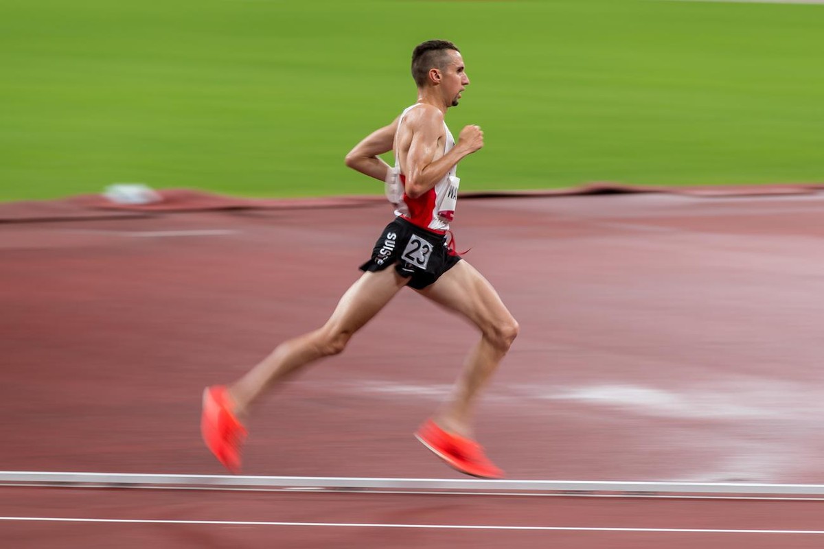 Julien Wanders of Switzerland on the final kilometer of the men's 10000 m final at the Olympic Games in Tokyo, on Friday, July 30, 2021 (KEYSTONE/ATHLETIX.CH/ULF SCHILLER)