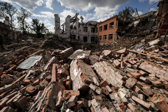 epa10846753 A destroyed school in the frontline city of Orikhiv, Zaporizhia Oblast, Ukraine, September 7, 2023, amid the Russian invasion.  The school functioned as a center for the distribution of...