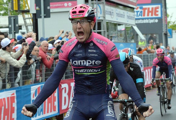 Italy&#039;s Sacha Modolo celebrates as he crosses the finish line to win the 13th stage of the Giro d&#039;Italia, Tour of Italy cycling race from Montecchio Maggiore to the seaside resort of Jesolo, ...