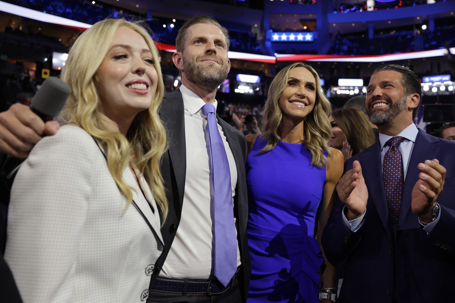 epa11480623 (L-R) Tiffany Trump, Eric Trump, Lara Trump, and Donald Trump Jr. pledge Florida?s votes during the nomination process for former President Donald J. Trump on the opening day of the Republ ...