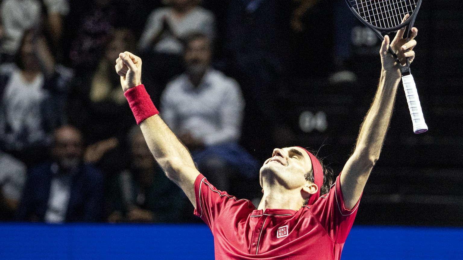 Roger Federer of Switzerland celebrates after defeating Alex De Minaur of Australia during their final match at the Swiss Indoors tennis tournament at the St. Jakobshalle in Basel, Switzerland, on Sun ...